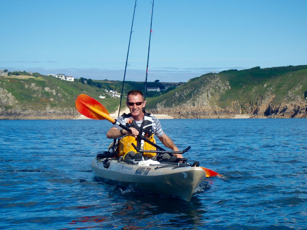 Steve kayak fishing at Porthcurno