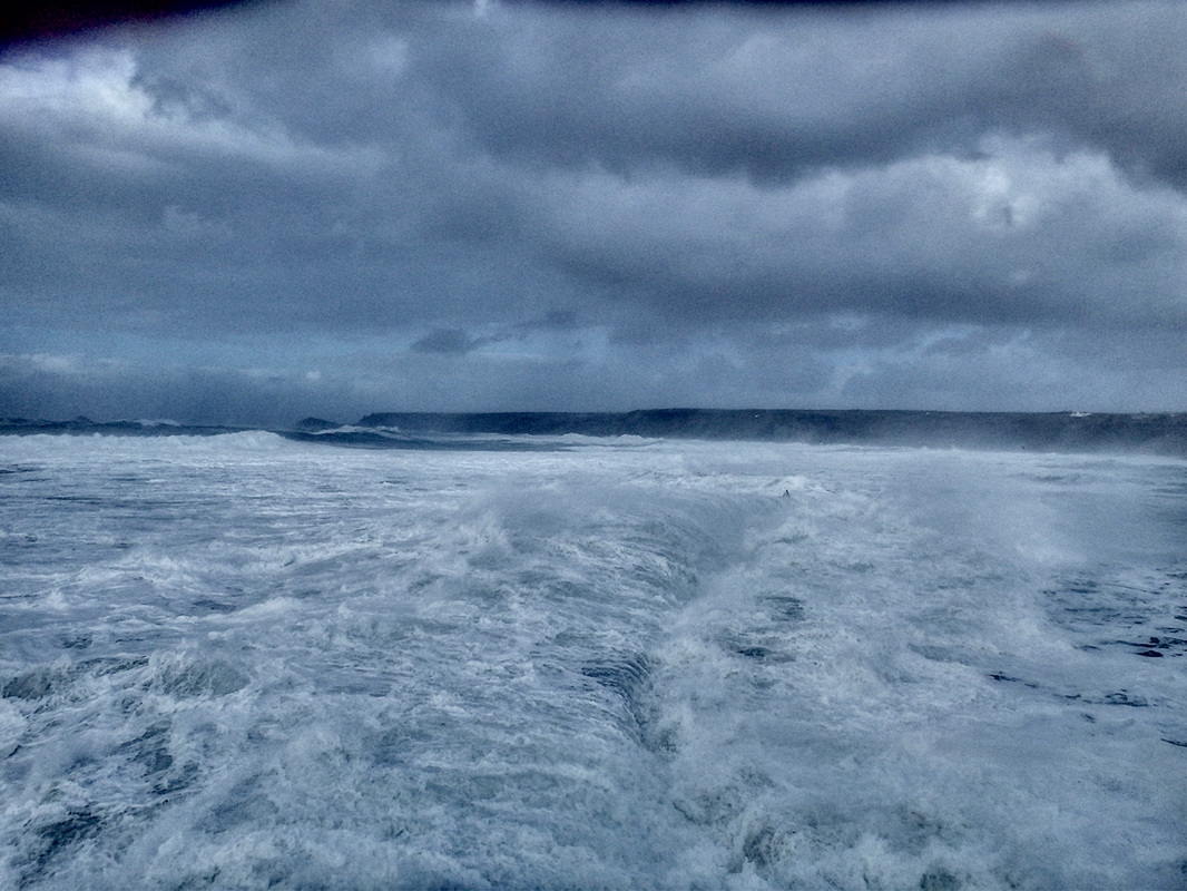 Powerful swell surging over Sennen Breakwater during Storm Imogen