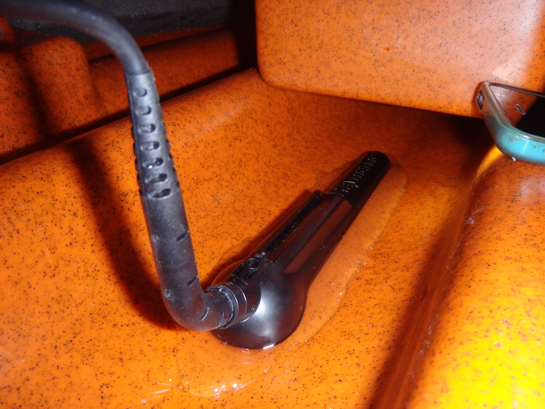 Marine Goop transducer inside a kayak