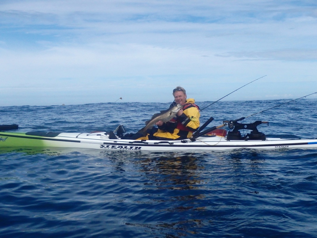 Craig with a Pollack at the Penzance Kayak Fishing Meet 2015
