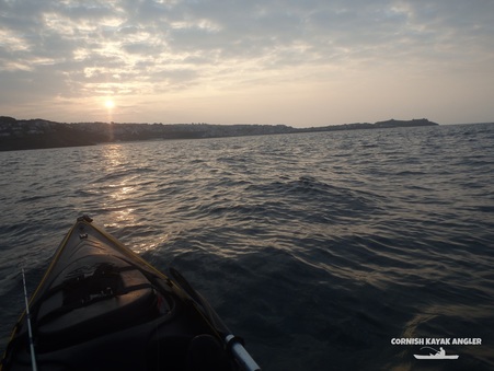 Kayak Fishing at Carbis Bay - looking towards St Ives on a calm summers evening