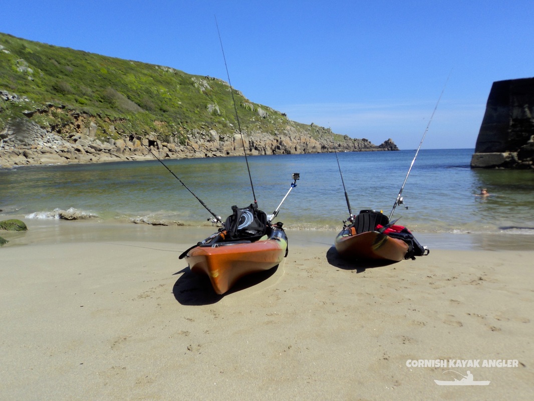 Kayak Fishing at Lamorna - Launching from the harbour beach on a calm day