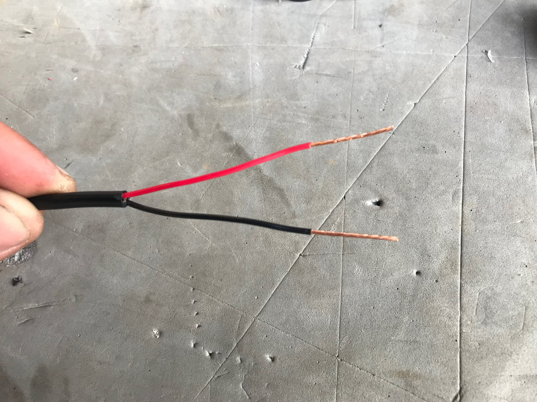 Stripping back a fish finder power cable 