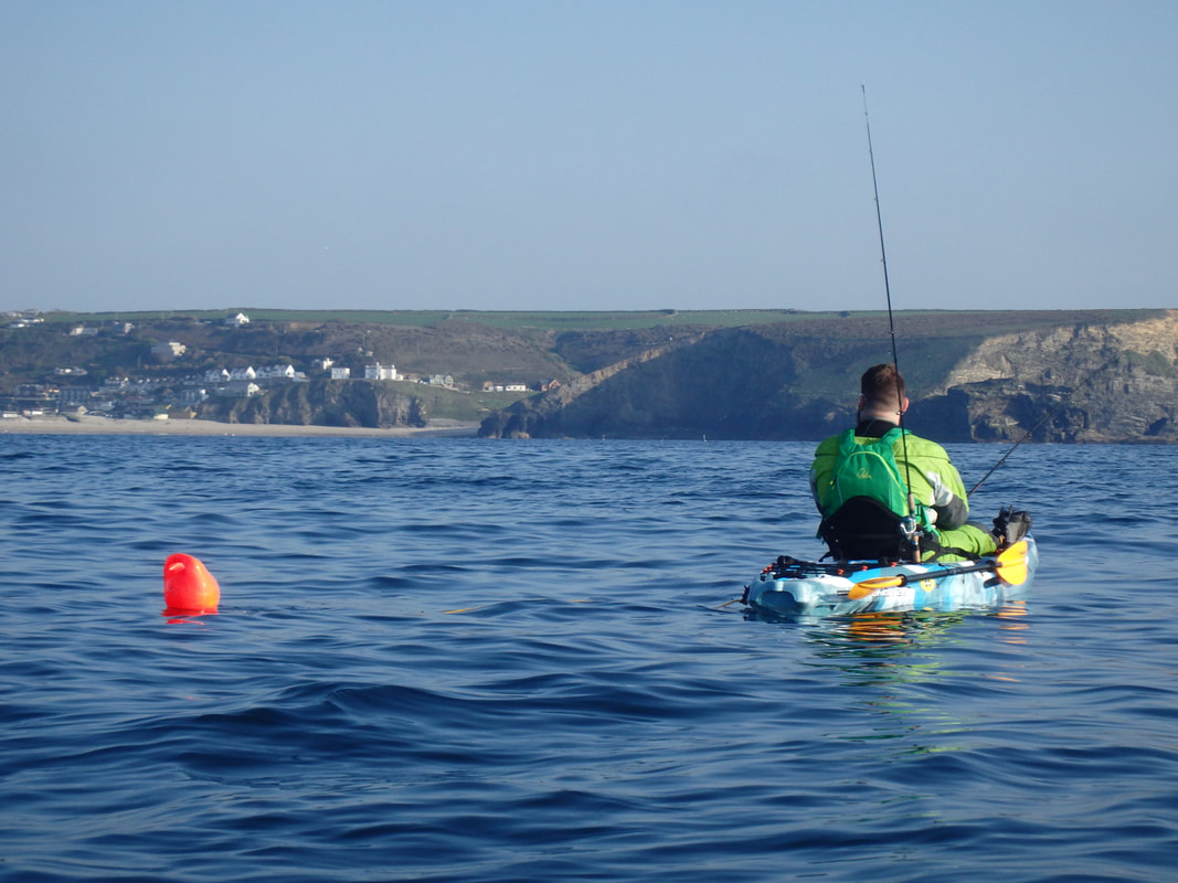 Anchoring on a fishing kayak using a quick release system