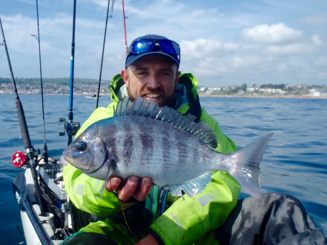 Kyle Waterhouse with a Black Bream caught at Swanage