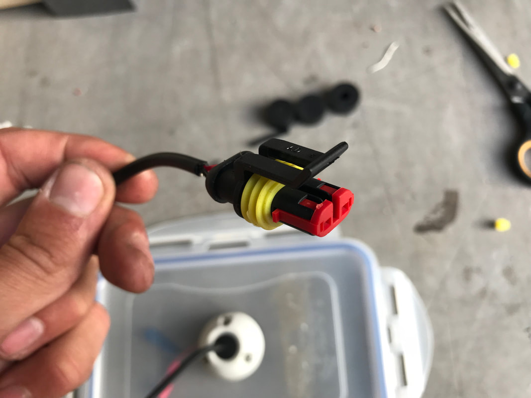 Superseal connector on a kayak battery box 